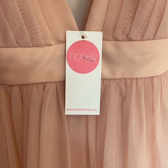 New with Tags. Beautiful Deep V Cross Back Gown - Picture 2 of 3